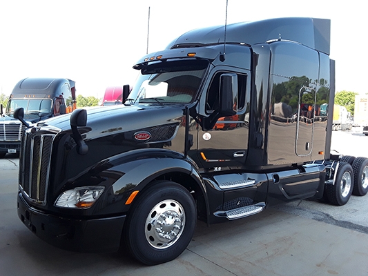 Peterbilt truck with black-painted exterior
