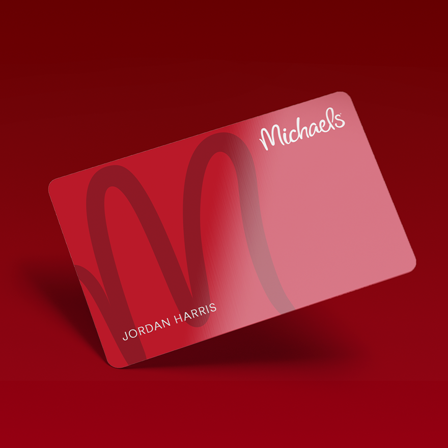 Michaels credit card on dark red background