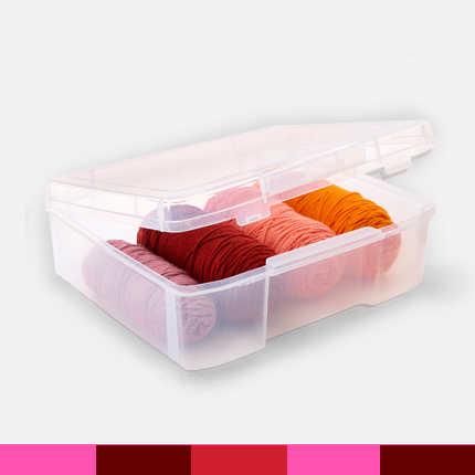 clear plastic storage case with skeins of yarn