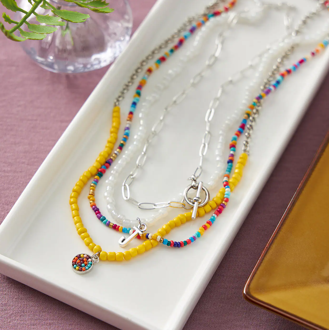 Beaded necklaces on a tray