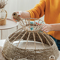 picture of an artist making a basket