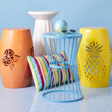 Stools in Organge, white, yellow, light blue and striped.