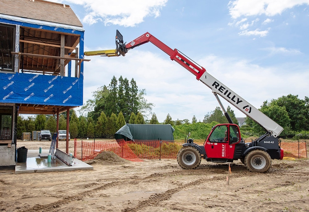 a lift being used on by Reilly on a new home construction project