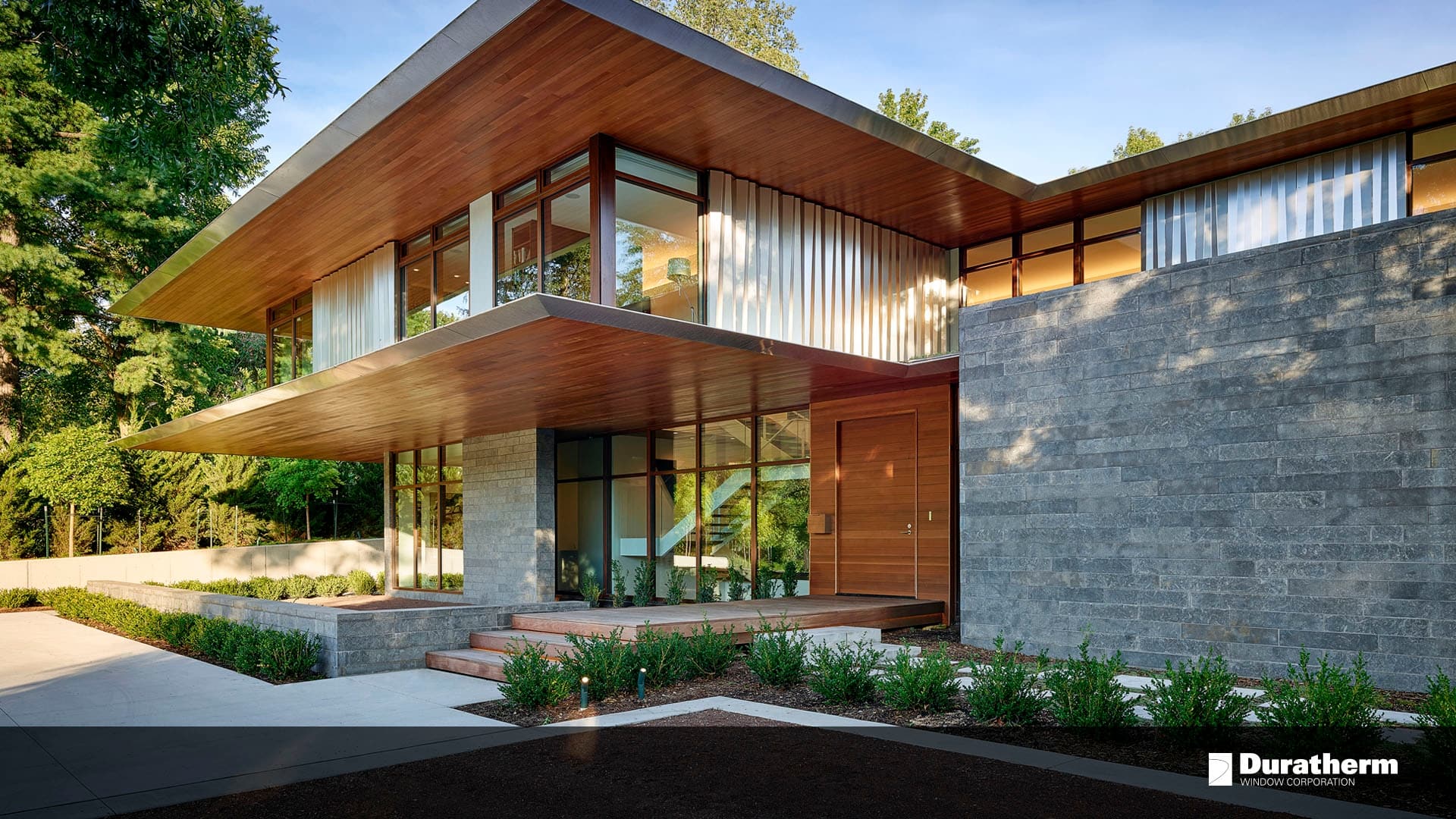 Kansas City, Missouri home exterior is a mixture of wood and stone