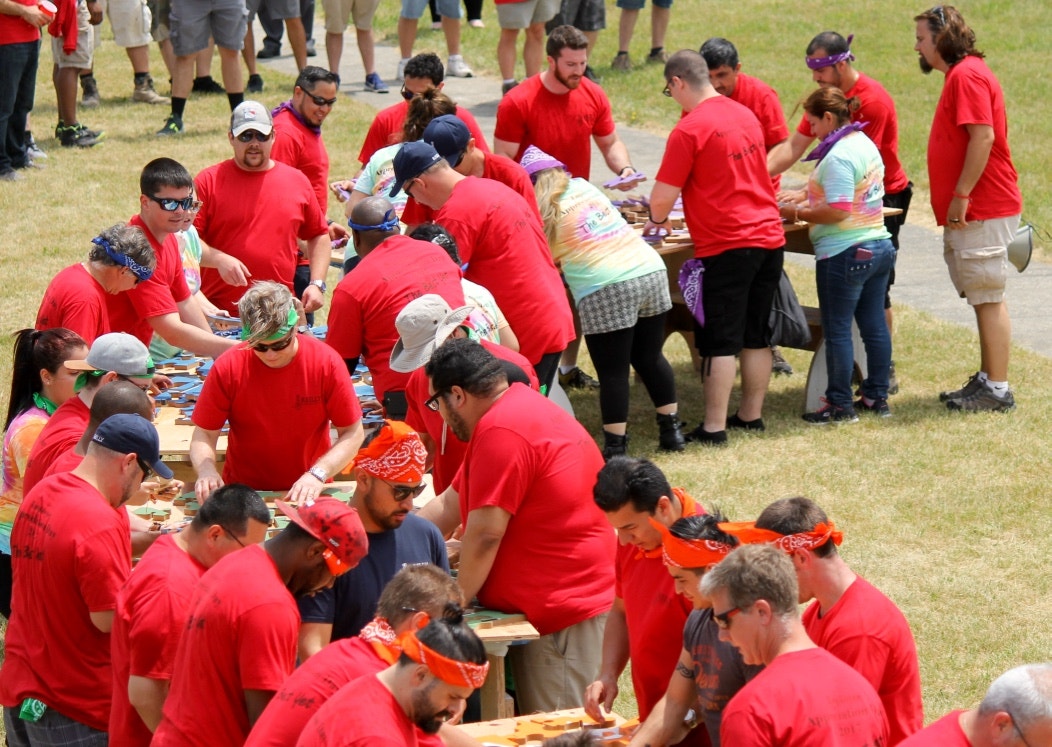 The Reilly team wearing red shirts at a picnic