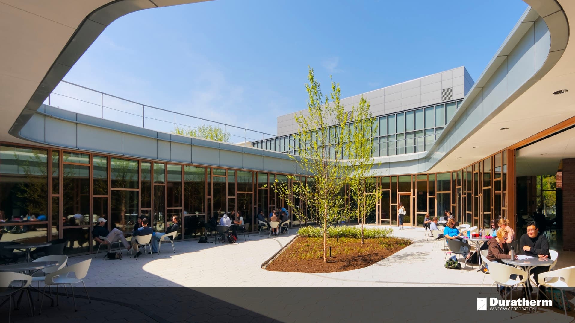 Educational building courtyard with window walls