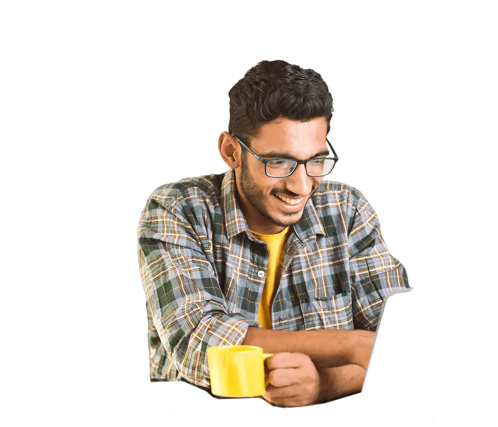 a professional man wearing glasses preparing to use Indeed’s matching and hiring platform to hire his next candidate