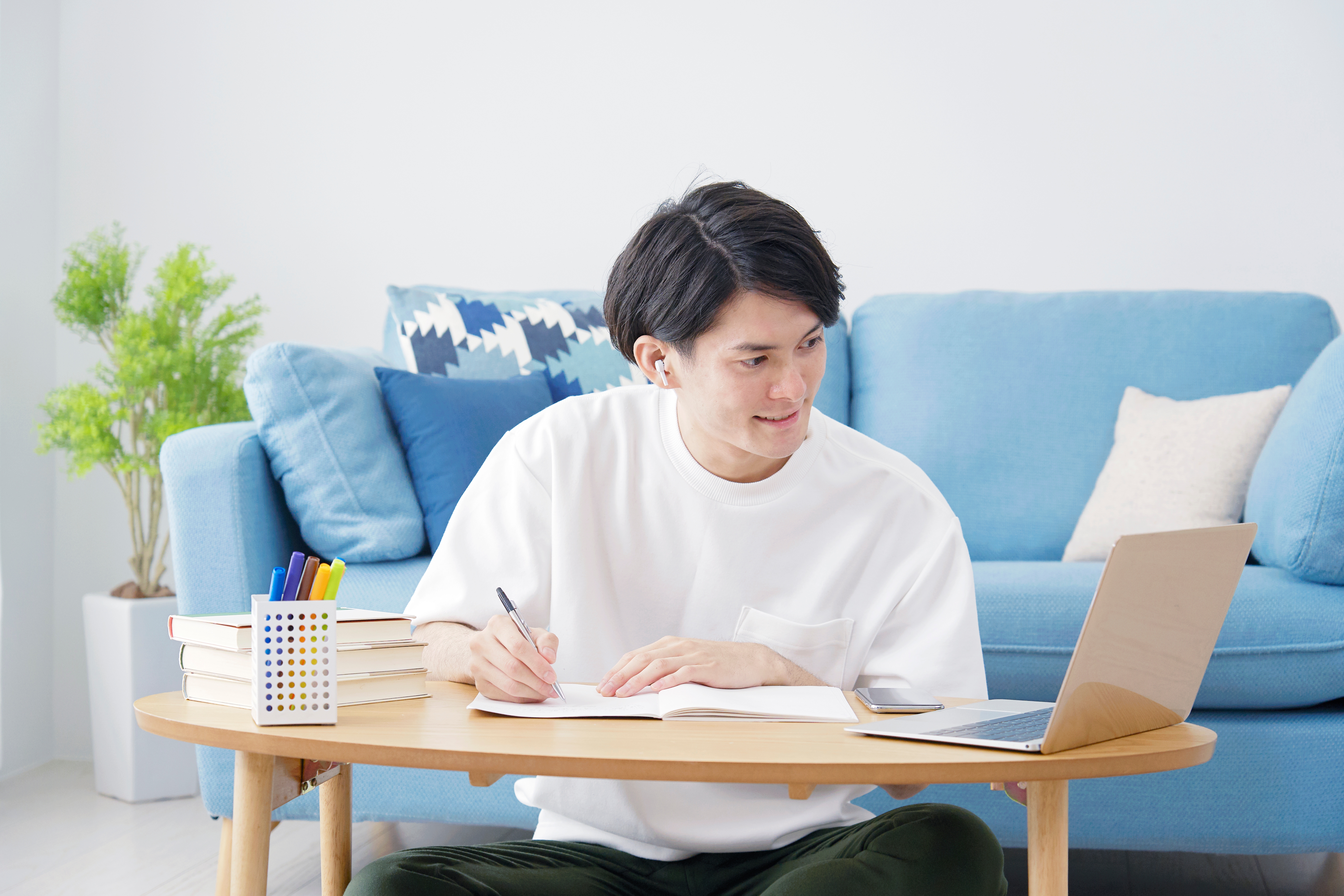 Man enhancing his writing skills online with MyBerlitz Writing Tutor