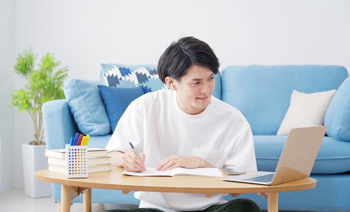 Man enhancing his writing skills online with MyBerlitz Writing Tutor