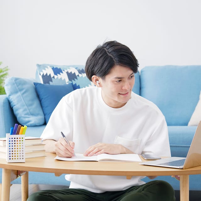 Man enhancing his writing skills online with MyBerlitz Writing Tutor