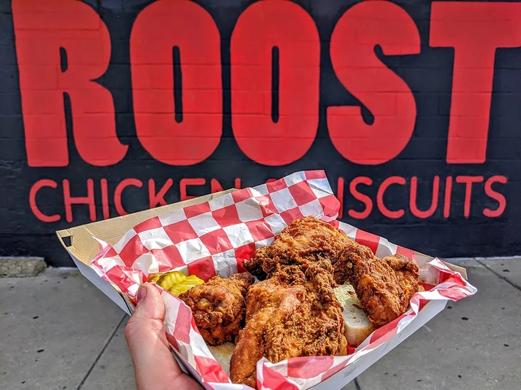 Roost Fried Chicken over soft pillowy bread