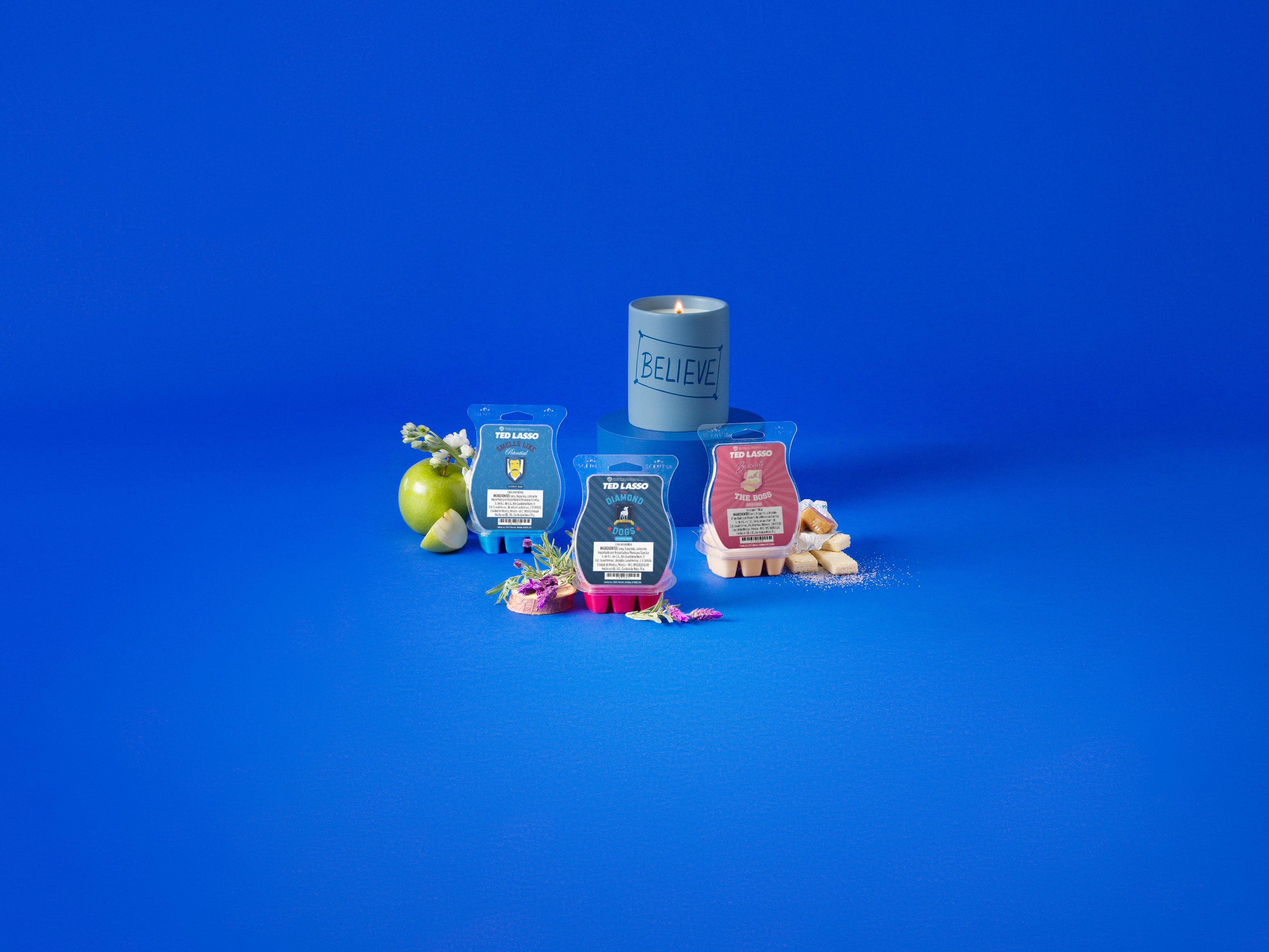 Ted Lasso Collection products are displayed with fragrance ingredients against a blue background.