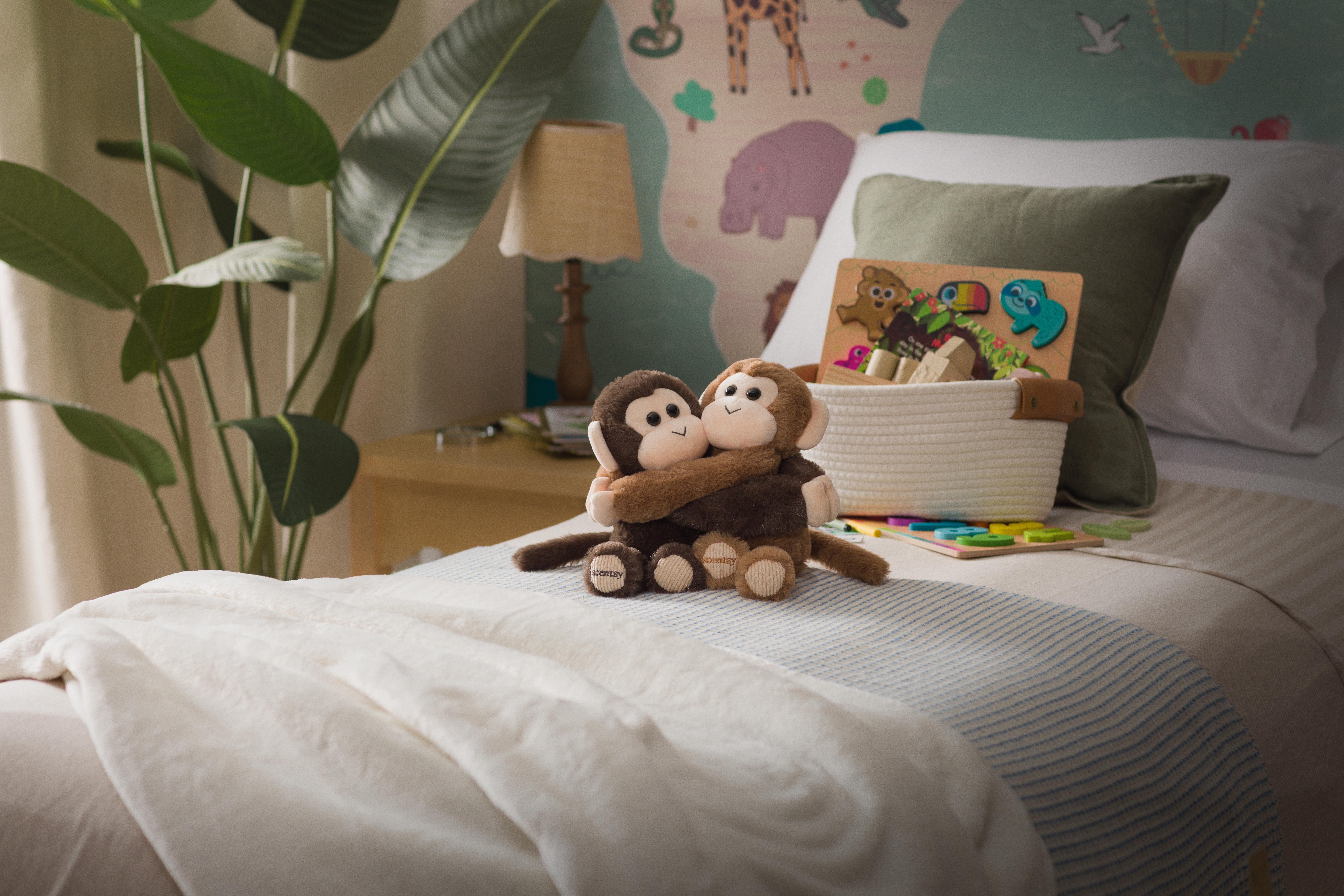 Scentsy's Charitable Cause product, the Mango & Mochi Hugging Scentsy Buddy's, displayed in a nursery.