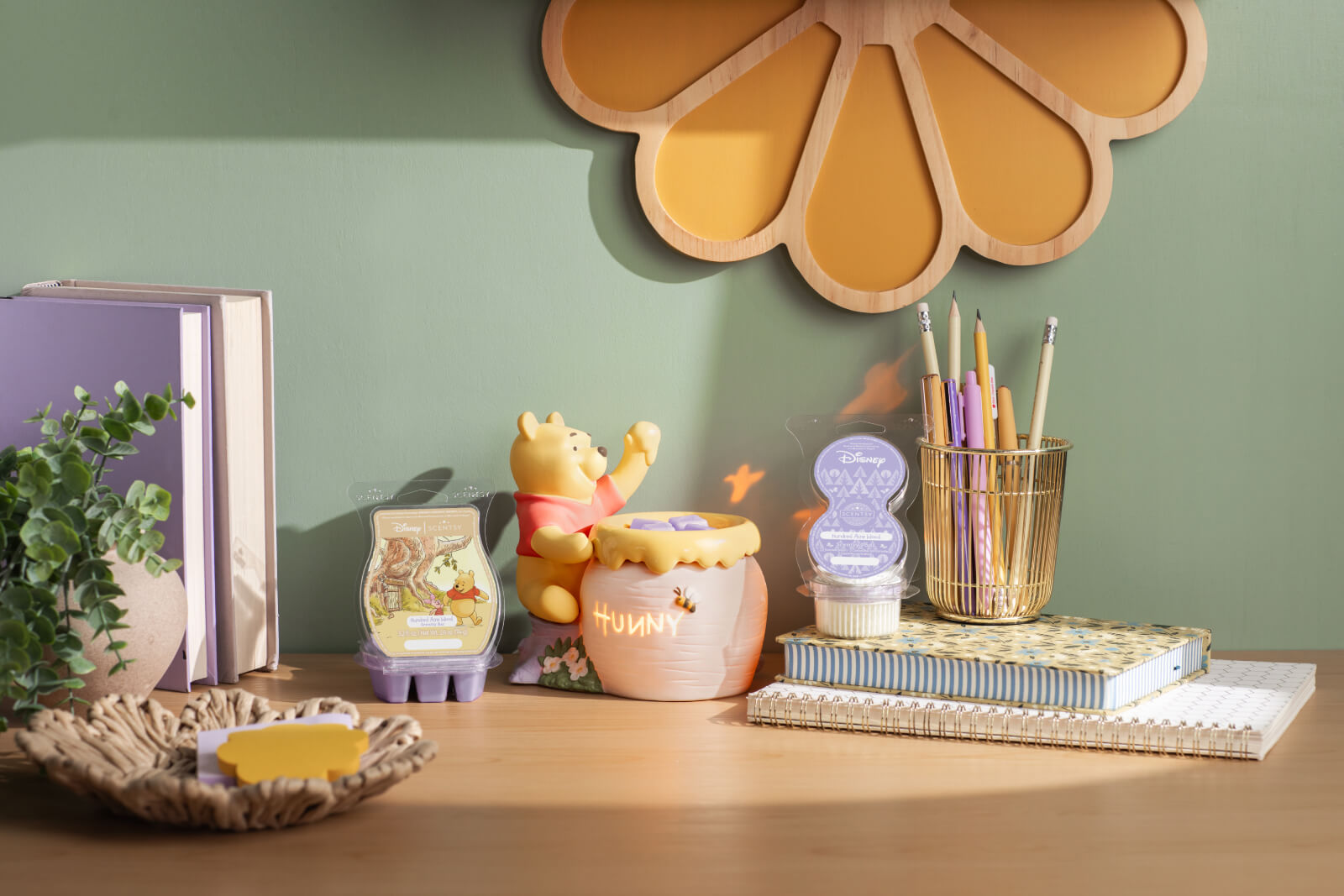 Winnie the Pooh collection products displayed in a vibrant, cheerful desktop setting