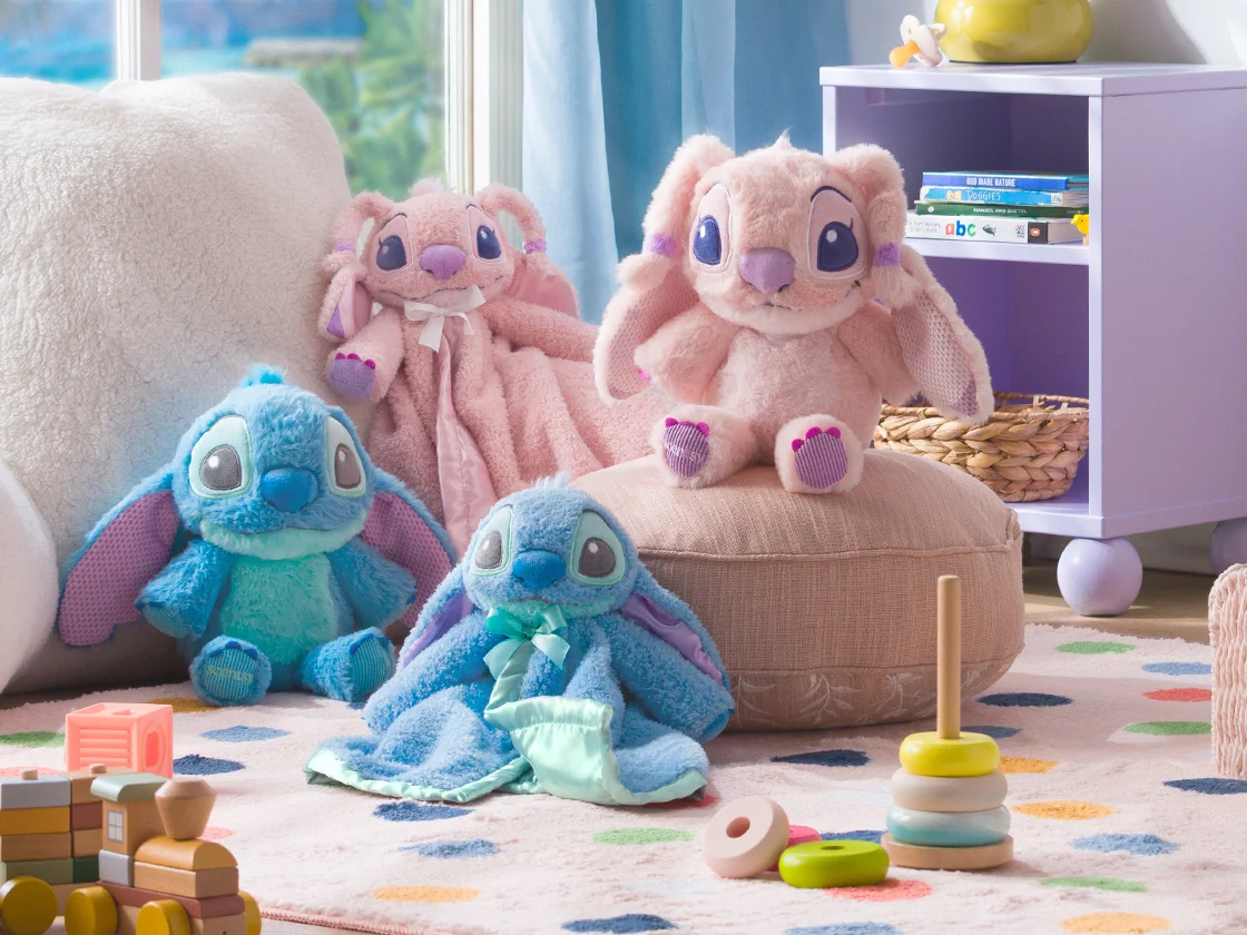 Disney Stitch and Angel – Scentsy Baby Buddies and Blankie Buddies are displayed in a playroom. 