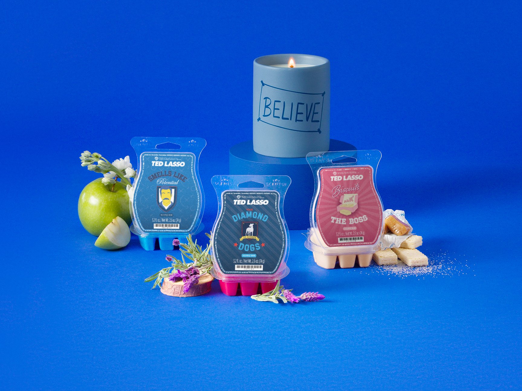 Ted Lasso Collection products are displayed with fragrance ingredients against a blue background. 