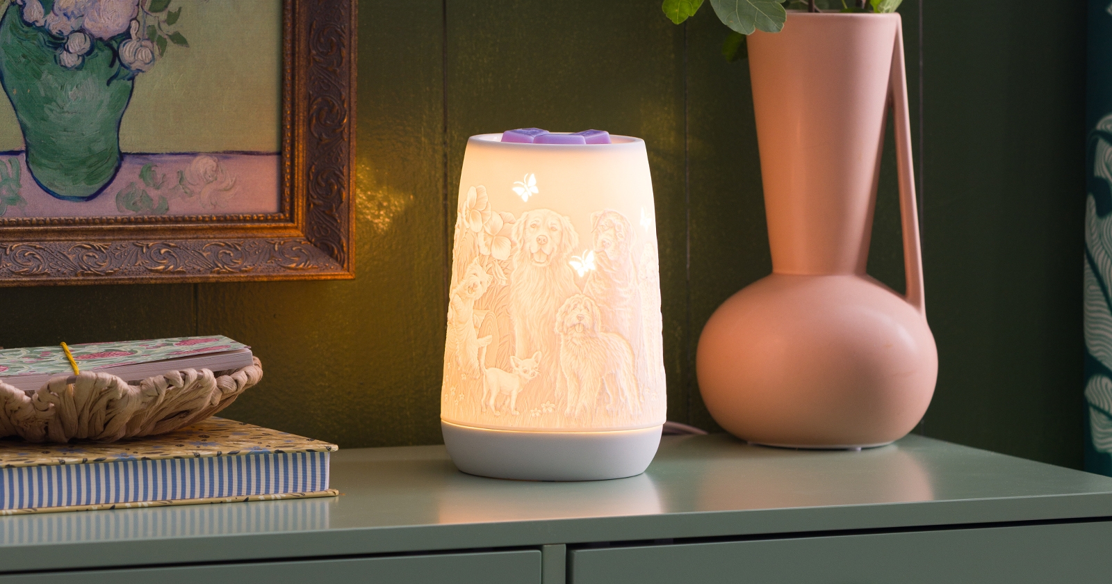 Tranquil Glow Scentsy Warmer: Light filters through golden succulents, casting a calming green ombre glow.