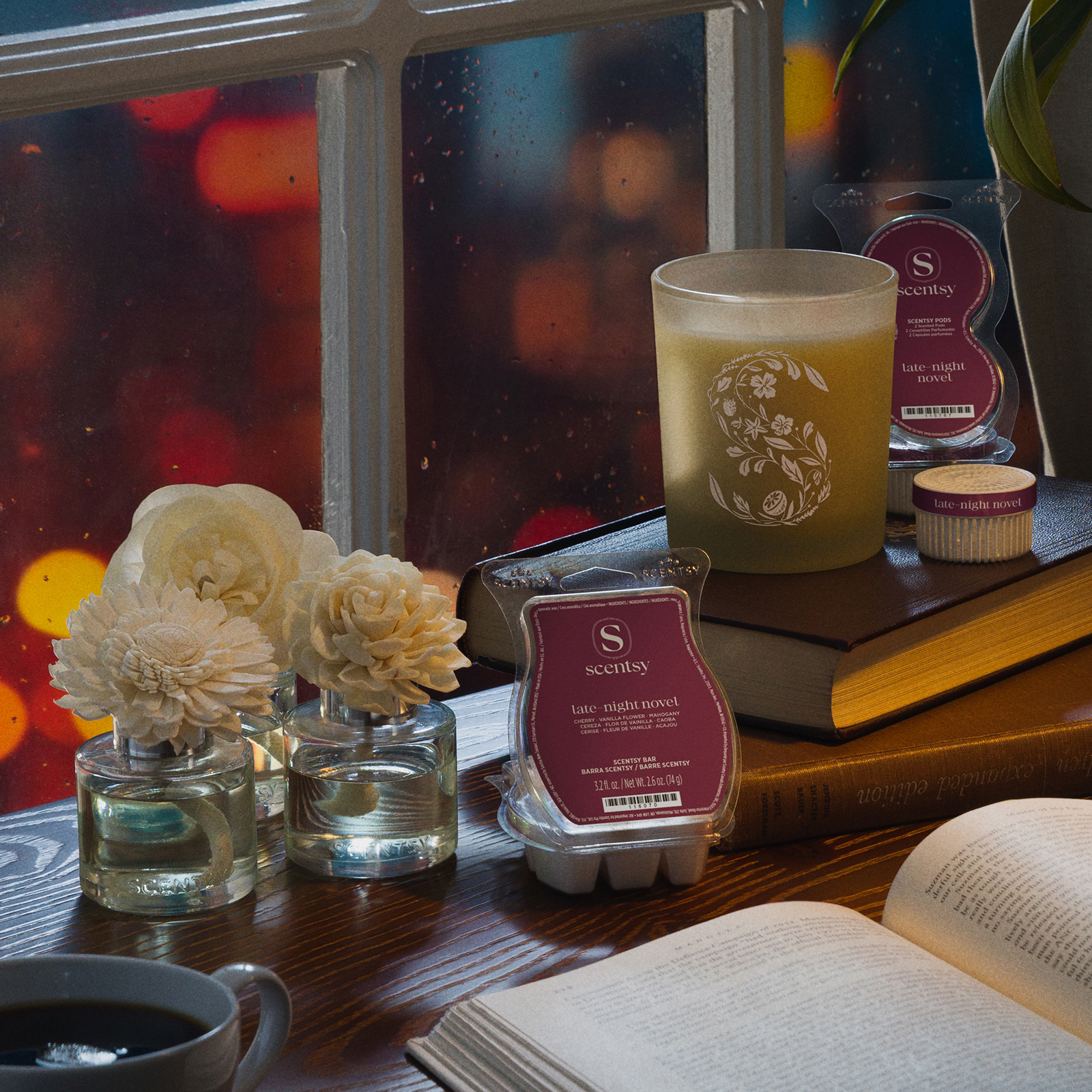 Scentsy products in the Late-Night Novel fragrance are displayed in a windowsill setting.