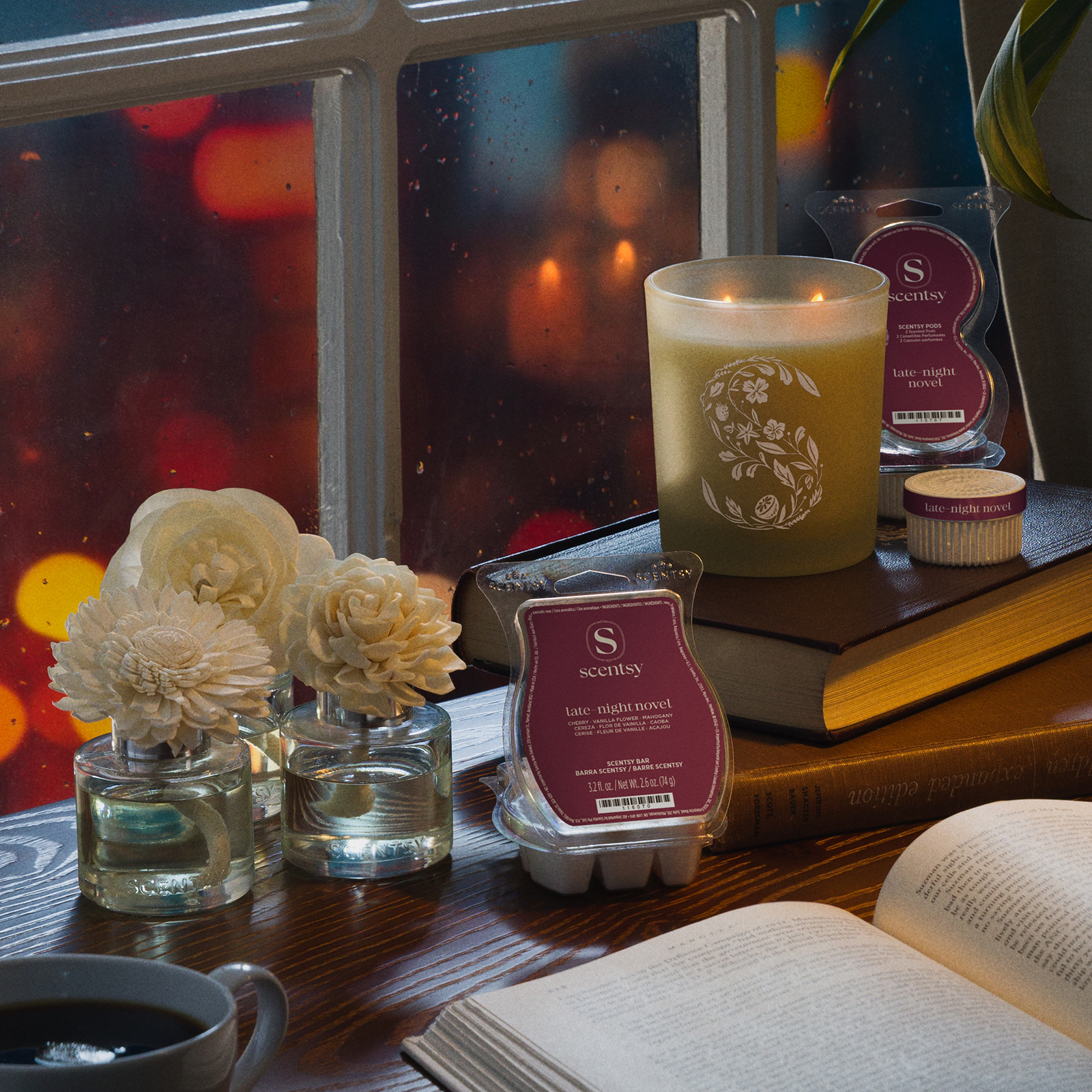 Scentsy products in the Late-Night Novel fragrance are displayed in a windowsill setting.