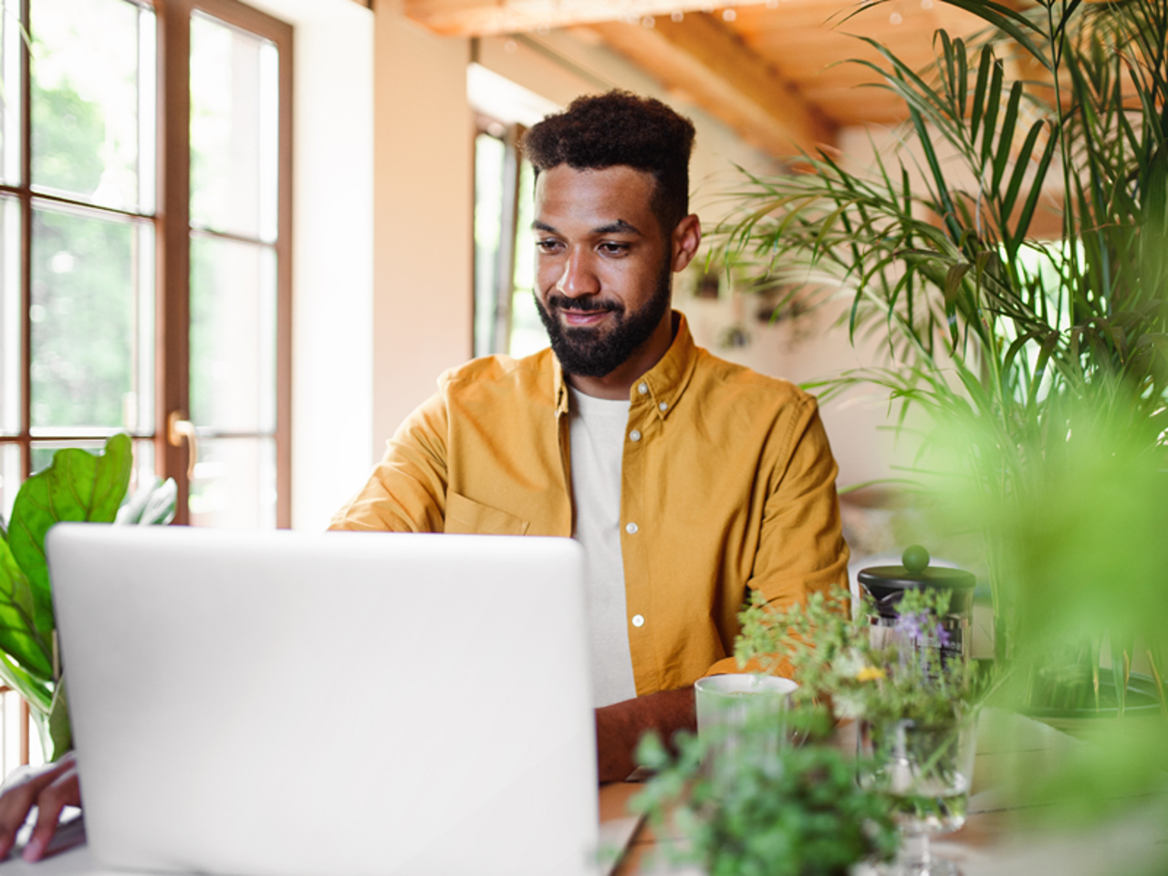 image-customer-story-southwest-tribe-man-at-a-computer.png