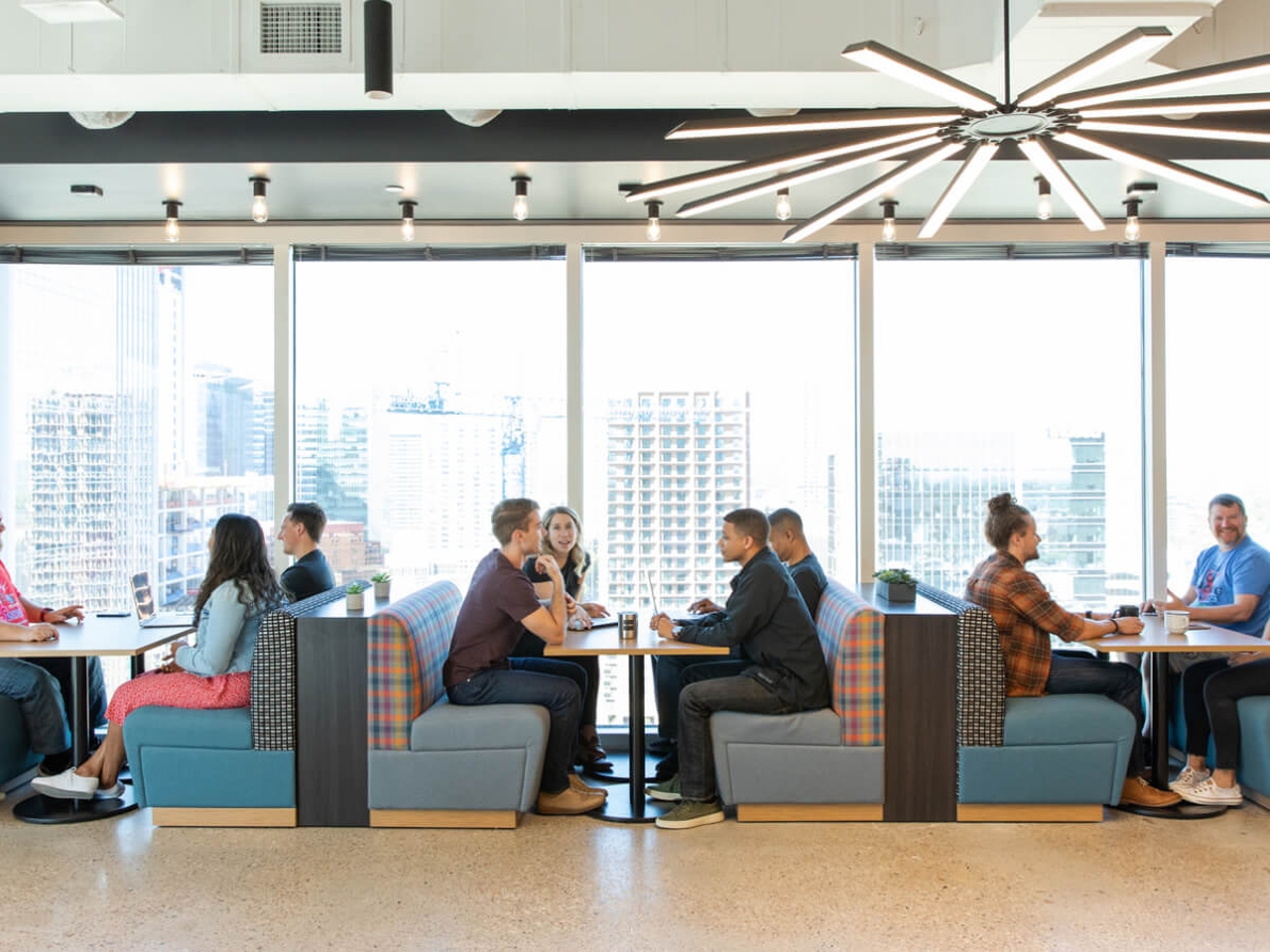 image-newsroom-people-sitting-in-boxes.jpg