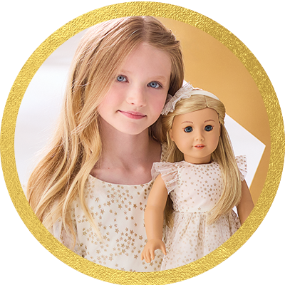 Girl playing with a Truly Me doll