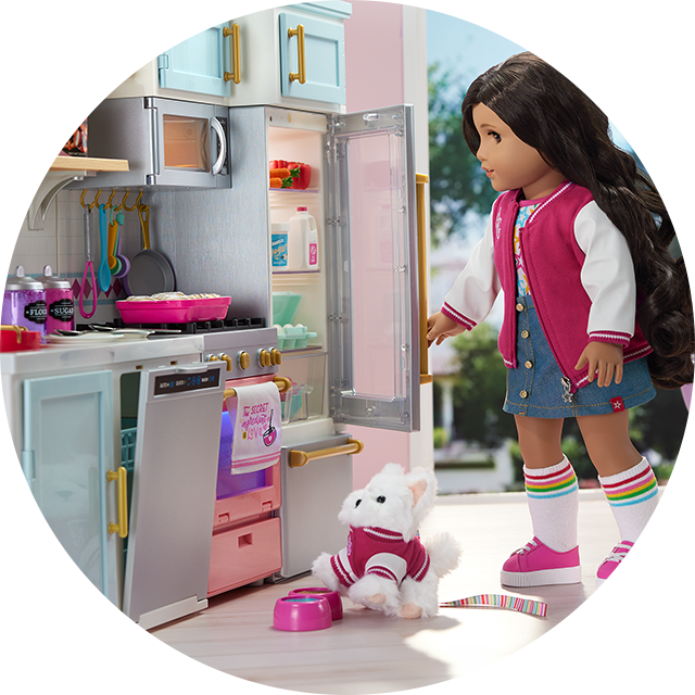 Doll in kitchen playset