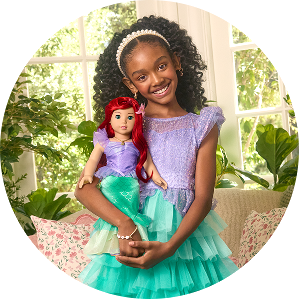 Girl and doll in matching Ariel outfit
