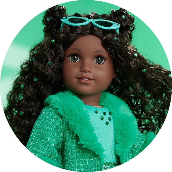 Doll in a May Emerald outfit