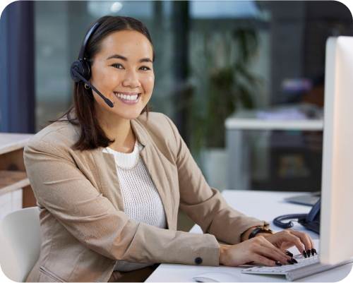 A female contact center agent using 8x8 cloud communication accessibility features