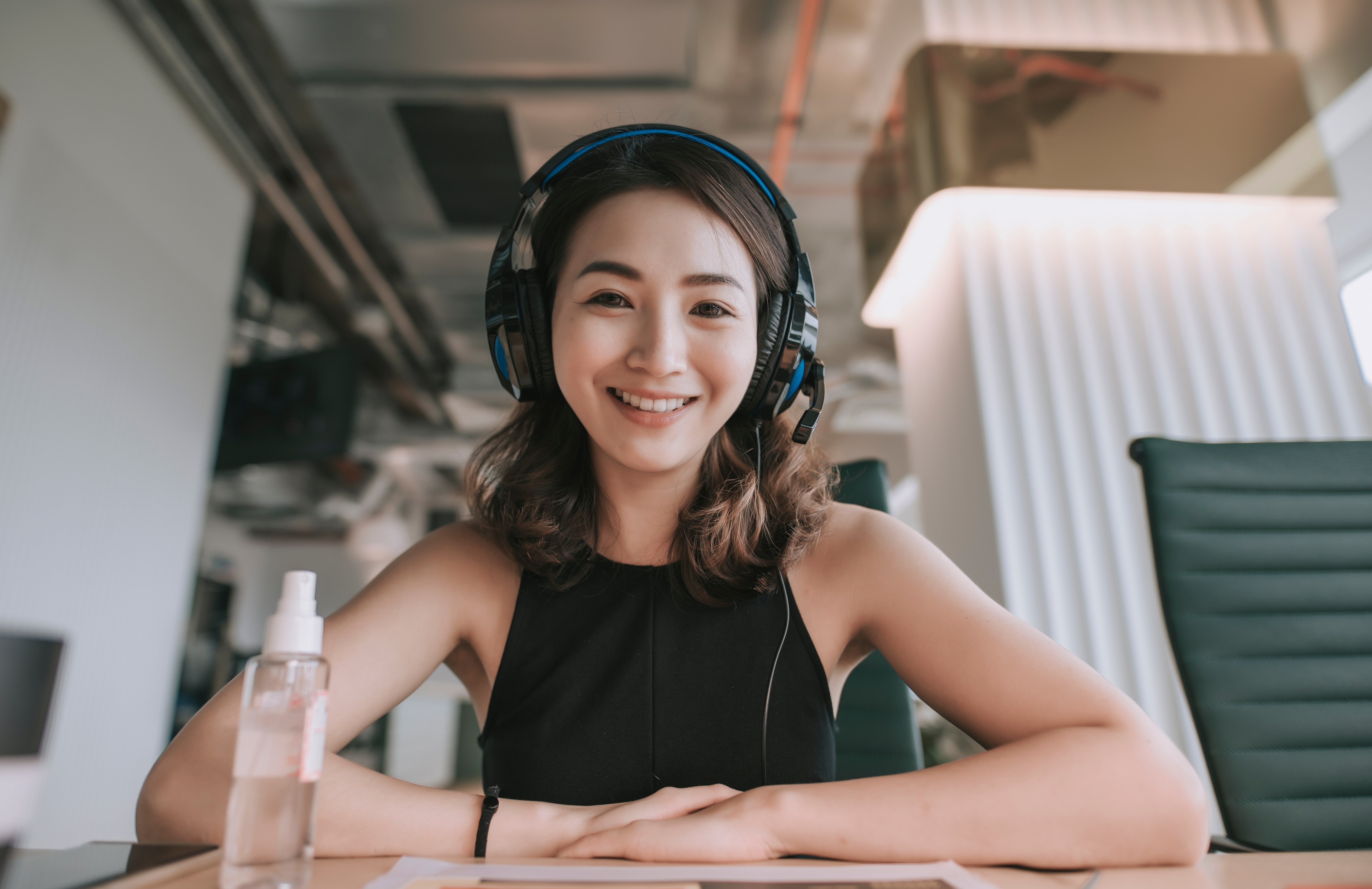 A girl with a headset indoors