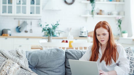 Woman learning a language with her online course in London