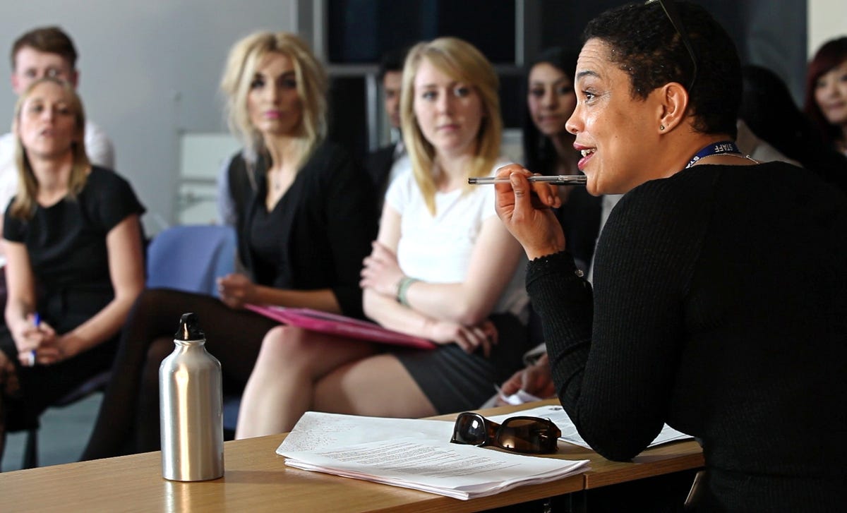 A group of people attending a Berlitz language lesson