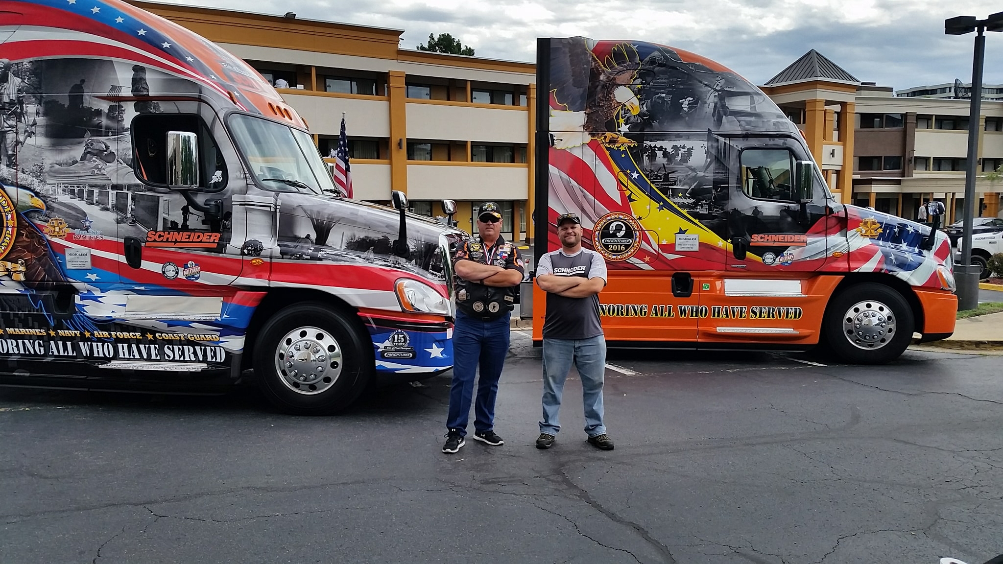 Ride of Pride drivers David and Jon with their military-themed trucks.