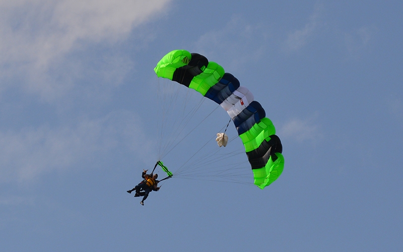 Jay and his instructor brace for landing as they return to the ground.