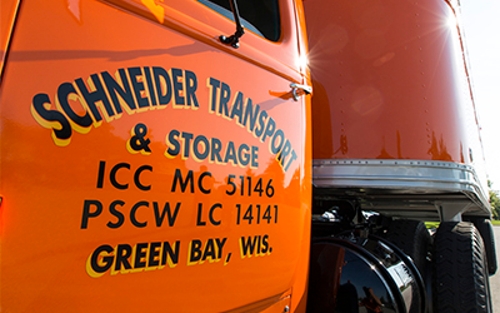 Restored Schneider truck door decals that read "Schneider Transport & Storage. ICC MC 51146 PSCW LC 14141 Green Bay, Wis."
