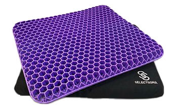 A square, purple seat cushion with honeycomb holes sits on top of its black cushion cover.