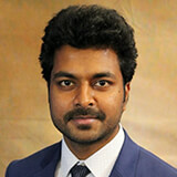 Headshot of Lakshmojee, Data Scientist 