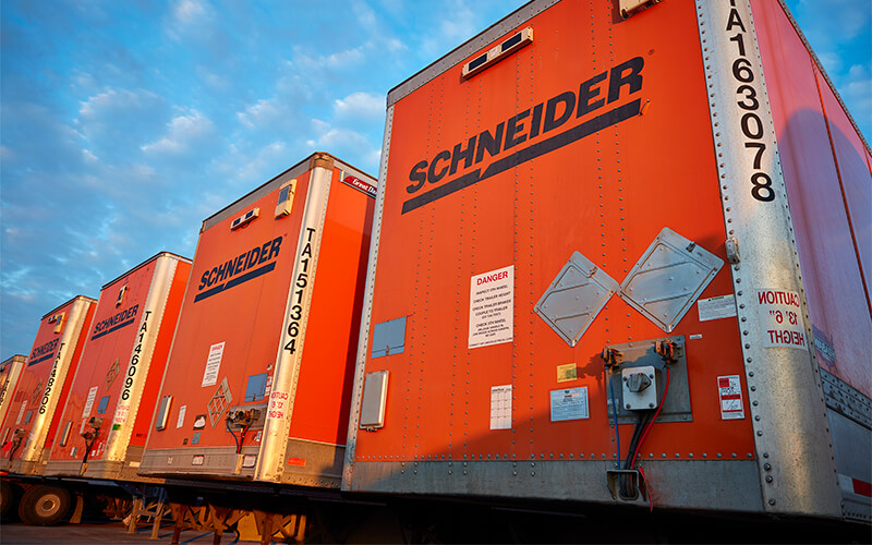 Rows of Schneider trailers