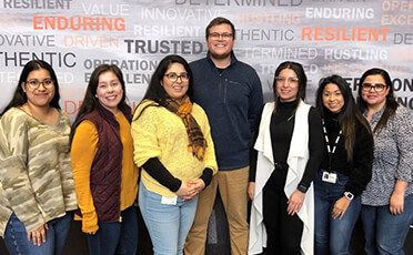 Schneider's team of Spanish-speaking recruiters