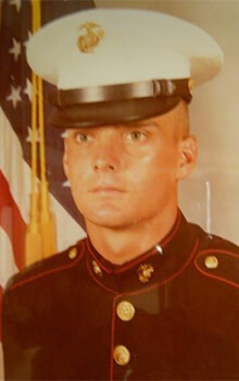 Headshot of Tom during his time in the U.S. Marines.