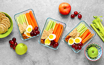 An assortment of healthy meal-prepped snacks.