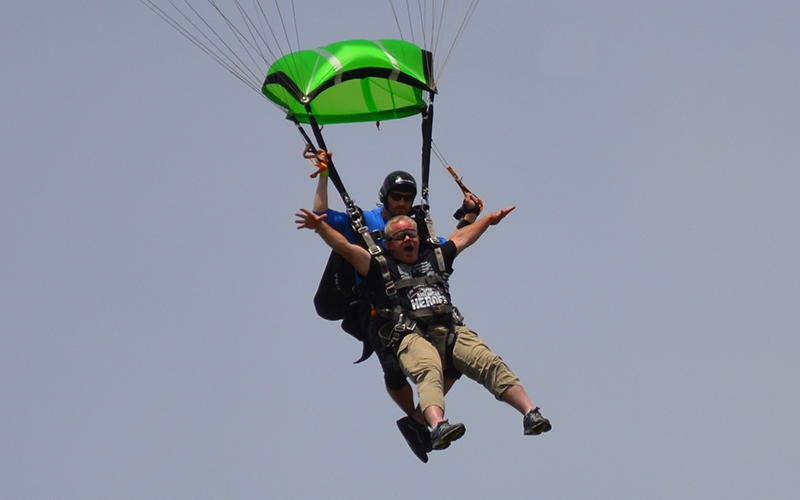 Chip stretches his arms out as he prepares to land.