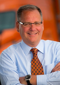 Headshot of Schneider CEO Mark Rourke