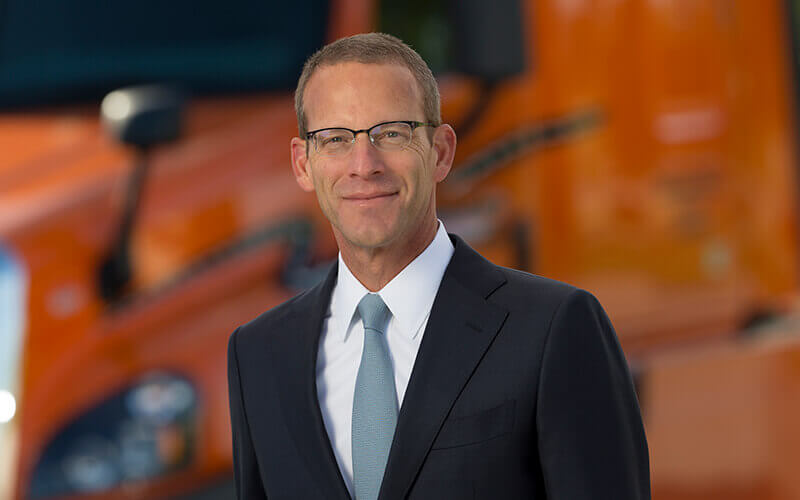 Headshot of Schneider CFO Stephen Bruffet
