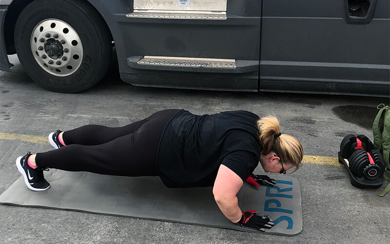 healthy truck driver performing pushups