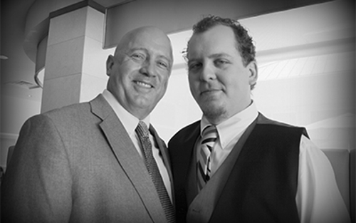 Father and Son Schneider Drivers David and Devon Price