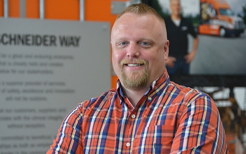 Driver Compensation Manager Tom Menger at Schneider's corporate headquarters.