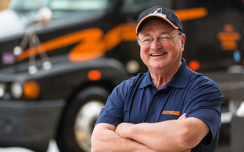 Bob Wyatt with his Schneider company truck