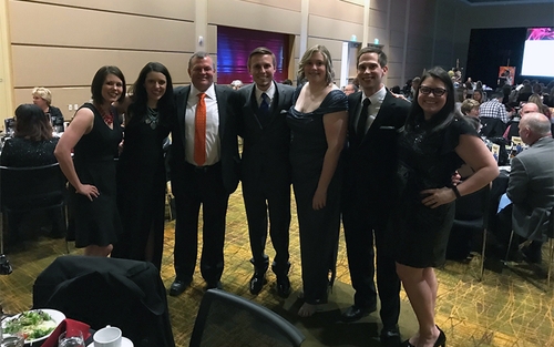 Schneider Employees accept 2017 Next Generation Best Place to Work Award